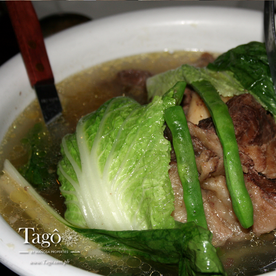 Bulalo Soup, a slow-cooked broth with beef shank and marrow, and garnished with fresh greens, is a favorite among guests visiting Tagaytay.